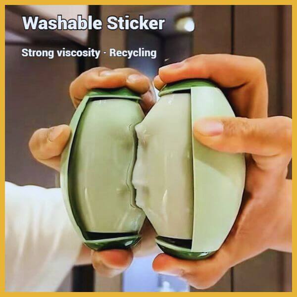 Hands holding two green washable reusable lint rollers with strong viscosity sticker comparison.