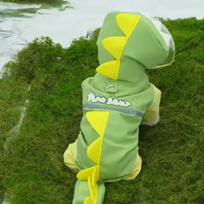 Full body dog raincoat with dinosaur tail design on grass
